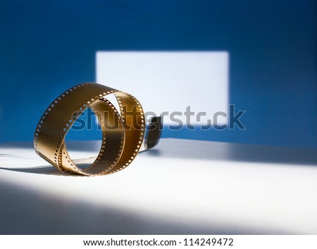 Golden film on the background of screen