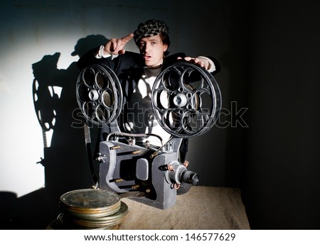 Projectionist is preparing to show the film