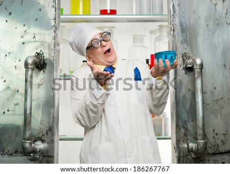 Crazy chemist with a bottle in the lab