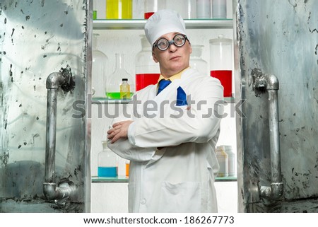 Crazy chemist standing at the door to the lab