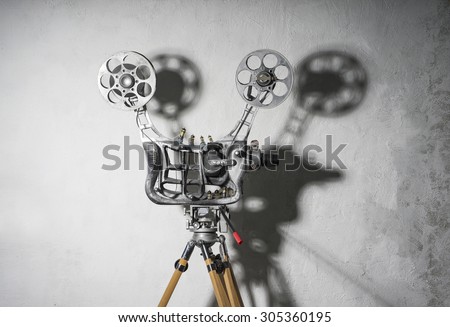 Movie projector with a film with a shadow