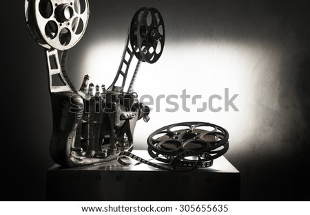 Movie projector on the background of wall