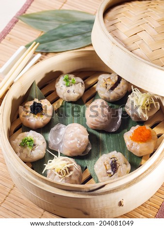 different kind of Dimsum Hagao in chinese bamboo basket