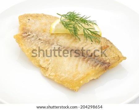 Fish dish. fried fish fillet on white background
