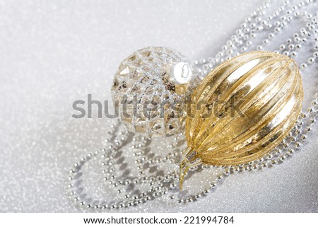 Festive beautiful christmas decoration on abstract white glitter background. two objects