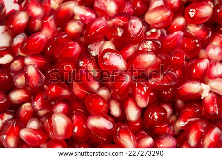 Fresh pomegranate seeds for food background