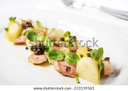 squid cooked with potatoes and wheat germ