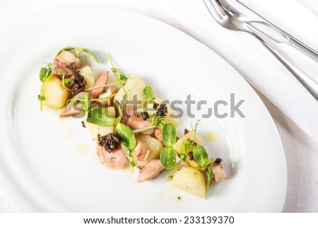 squid cooked with potatoes and wheat germ