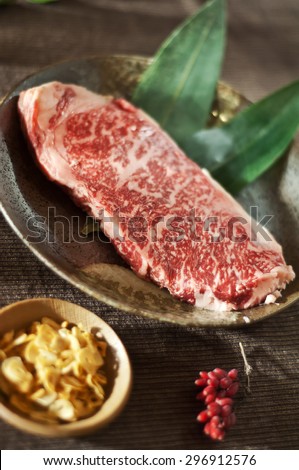 Raw fresh marbled meat Black Angus Steak. Japanese Kobe beef