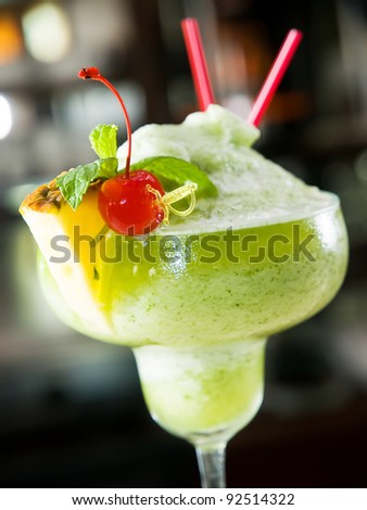 cocktail with pineapple and cherry