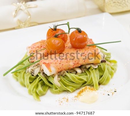 pasta with crab meat and cherry tomatoes