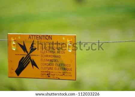 Attention electric fence sign - do not touch