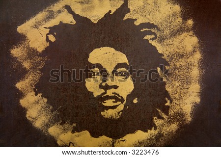 Graffiti Bob Marley on tree box Graffiti Bob Marley on tree box