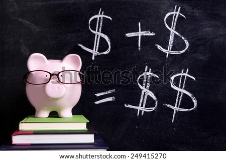 Pink piggy bank with glasses standing on books next to a blackboard with simple money savings plan.