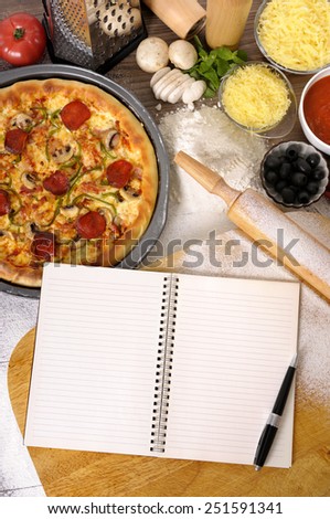 Pizza making, recipe book, copy space.