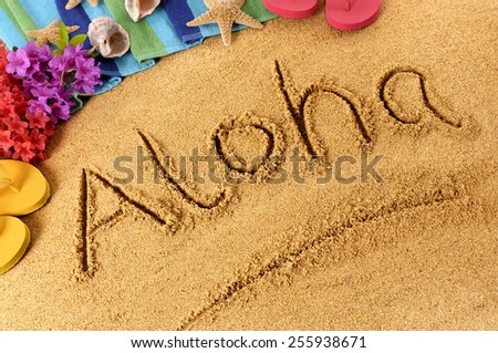 Aloha Hawaii beach : word Aloha written in sand.