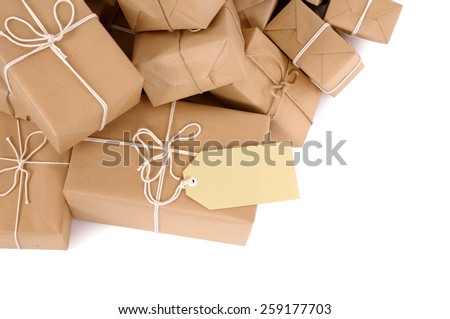 Parcel : Untidy pile of brown package, label, isolated