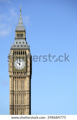 Big Ben clock tower London, isolated against sky, vertical, copy space
