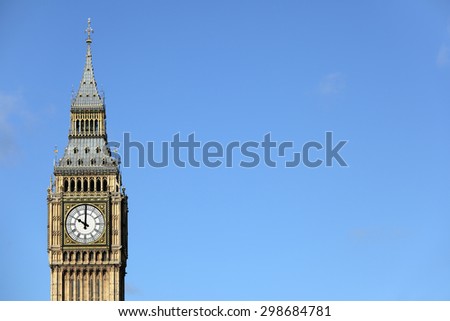 Big Ben clock tower London, isolated on blue sky, copy space