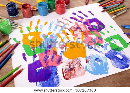School art and craft lesson, child painted handprints