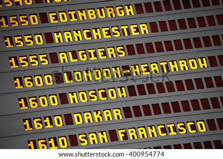 Airport arrivals and departures display board closeup