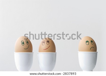 Eggs in a Love Triangle.  Two in love, one dejected.