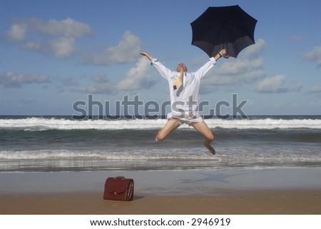 Senior business man undressed and jumping with happiness and freedom on a beautiful beach. Retirement, vacation, escaping stress concept.  Copy space.