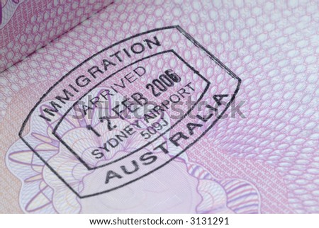 Australia immigration entry stamp on the inside page of a passport.  Space for copy.