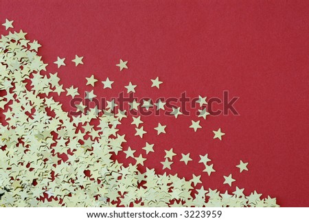 Gold stars on a red flock background.  Note that three corners of the image have been left spare to allow for alteration of the canvas size to suit various design requirements.