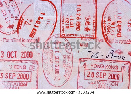 Asian passport page with various entry and exit stamps