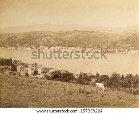 ISTANBUL, TURKEY - CIRCA  1900\'s :Cityscape in old Istanbul, Bosphorus Strait and Asian Side on the other shore