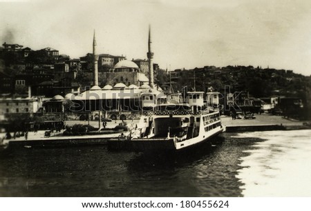 ISTANBUL, TURKEY - CIRCA 1900:  Vintage cityscape of Istanbul.Uskudar pier in istanbul. Turkey, circa 1900.