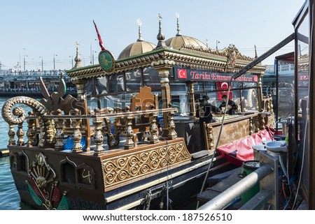 ISTANBUL, TURKEY - APRIL 06: Traditional fish restaurants at sea on April 06, 2014 in Istanbul, Turkey. Traditional fish restaurants are symbol of Eminonu.