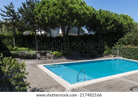 Private swimming pool in garden