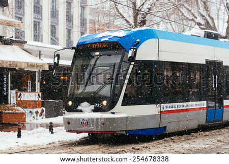 ISTANBUL, TURKEY - FEBRUARY 18, 2015: istanbul winter a day.Modern tram on Sultanahmet District.Istanbul is a modern city with a developed infrastructure.