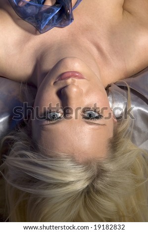 Upside down image of blonde woman\'s face
