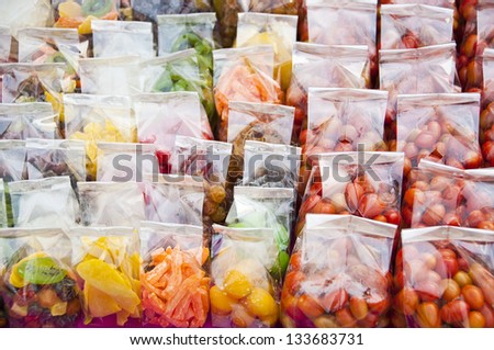 Dry preserved fruit in plastic bag.
