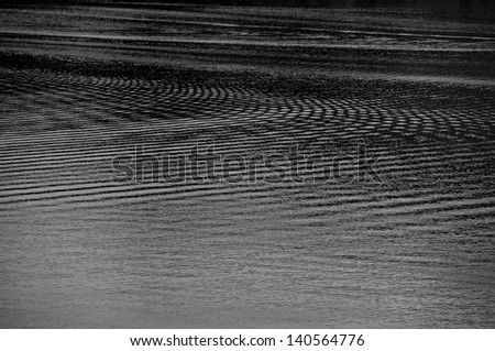 Black and white water ripple.