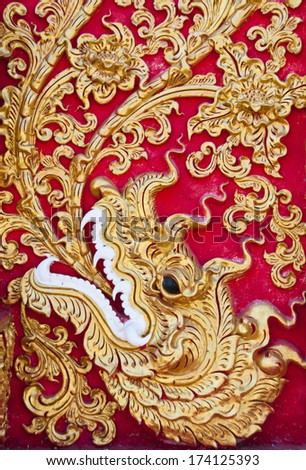 Thai art decoration on temple wall.