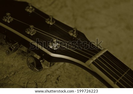 Guitar neck and tuner retro style.