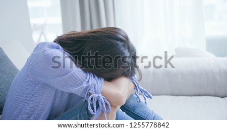 The depression woman think something at home