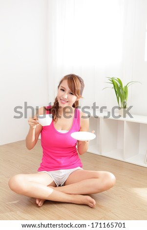 Beautiful Young Woman drinking coffee or tea at home in the morning, healthy lifestyle concept, asian beauty