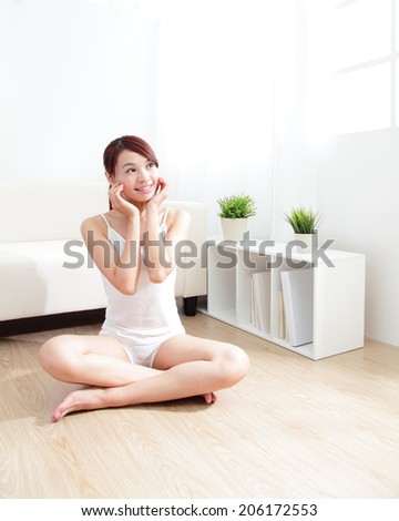 Beautiful skin care young woman happy hand touch her skin at home, asian beauty