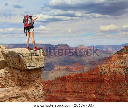 Woman mountain Hiker with backpack enjoy view in grand canyon, asian