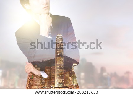 double exposure business man and city - business man think with city night skyline, asia, china, hong kong
