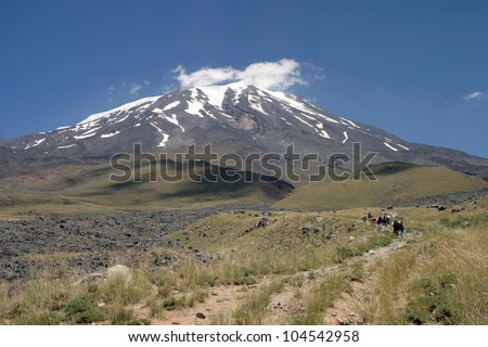 Porters and horses going down to Green Camp in Mount Agri, Turkey. Mount Agri (Ararat) is the highest mountain in Turkey and It is believed that Noah Ark is there.