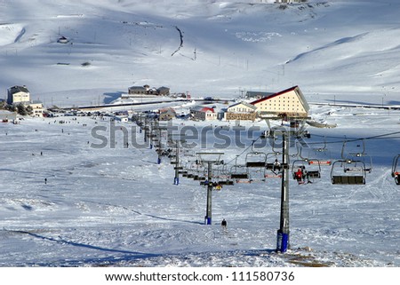 ERCIYES, TURKEY - FEBRUARY 20: View of the ski slopes and chair lifts at Mount Erciyes ski area, February 20, 2007 in Kayseri, Turkey. Mount Erciyes ski area is one of the longest slope in Turkey