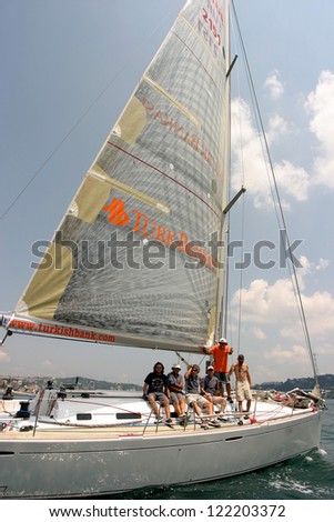 ISTANBUL, TURKEY - JULY 1: Turkish Bank team in Naviga Cup Sailing Race at Bosphorus on July 1, 2006 in Istanbul, Turkey. Naviga Cup Sailing Race from 60 racing boats participated.
