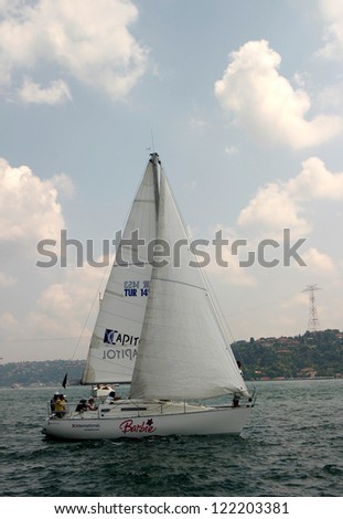 ISTANBUL, TURKEY - JULY 1: Barbie team in Naviga Cup Sailing Race at Bosphorus on July 1, 2006 in Istanbul, Turkey. Naviga Cup Sailing Race from 60 racing boats participated.