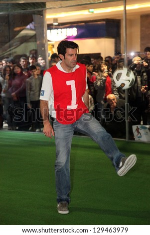 ISTANBUL, TURKEY - FEBRUARY 3: Famous Portuguese football player Luis Figo doing football show in astroturf on February 3, 2012 in Istanbul, Turkey.